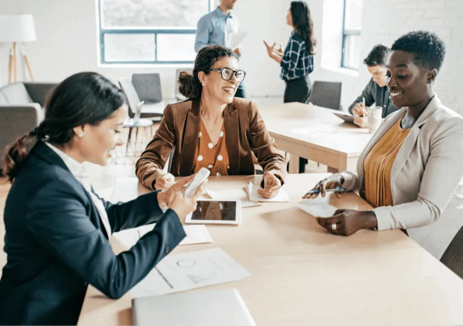 Small business owners meeting around a table